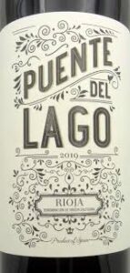 Botella de Puente del Lago, vino tinto Rioja con crianza.